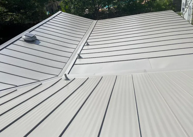 Solar attic fan installed on a metal roof for Roof Ventilation in San Marcos